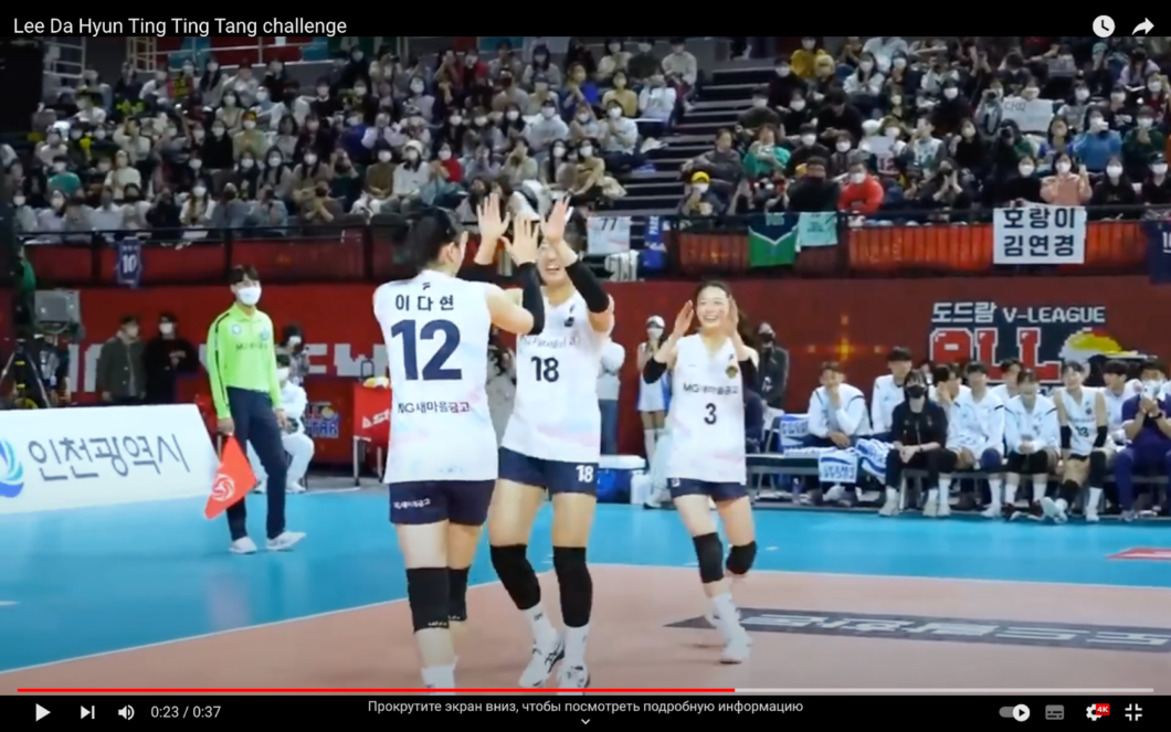 A team of female volleyball players congratulate each other